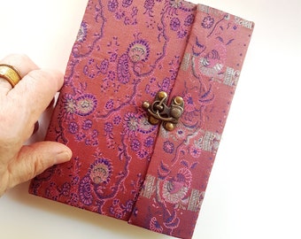 Vintage fabric sketchbook journal 5 by 7 inches. One of a kind blank book with artisan paper pages. Medieval look bronze metal lock closure.