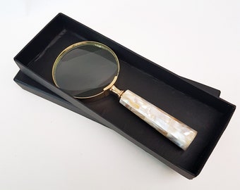 Vintage magnifying glass hand lens in antique brass design. Old world charm. Read small print easily, use for home &  hobby. Photos stamps.