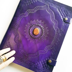 XL purple leather embossed journal with a golden sunstone center. For art, photos, hobbies.  Guest book for wedding, anniversary, memorial.