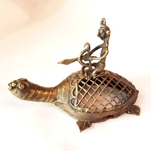 Tortoise statue metal art collectible. Vintage tribal turtle sculpture from Chhatisgarh region of India.  4 inches wide by 6 inches long.