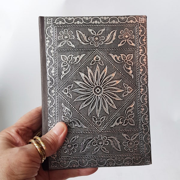 Journal notebook with medieval hardcover design 5x7 inch. Antique silver embossed cover. Use as sketchbook, record book, personal diary.