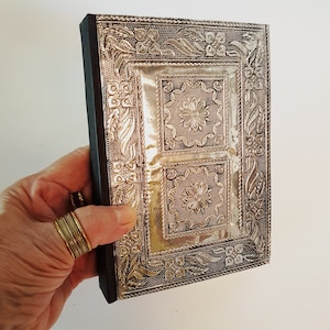 Medieval silver metal journal 5 by 7 inch. Antique embossed hardcover design. For drawing, record keeping, personal diary, creative writing.
