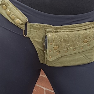 Utility festival belt. Lace detail design.  Use as travel & shopping money belt. Adjustable to 48 inches. Compact model with 2 pockets.