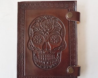 Hand bound journal notebook. Brown leather grimoire with embossed skull design. Halloween, Day of the dead, gothic theme diary. 6 colors.