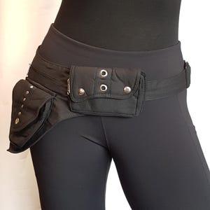 Nevada Black utility festival belt. Unisex design waist-hip-bum bag. Use as travel & shopping money belt. 4 zip pockets. Adjustable to 48 in
