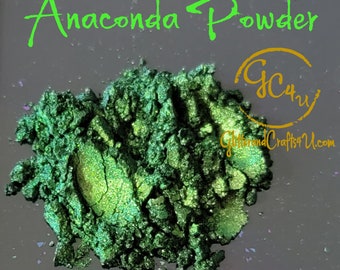 May include: Green iridescent powder with a shimmery finish. The powder is labeled "Anaconda Powder" and "GC4U GlitterandCrafts4U.com".
