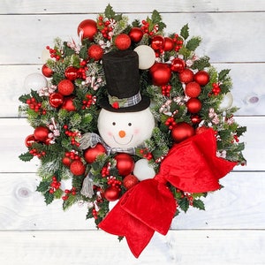 Extra Large Snowman Frosted Evergreen Christmas Wreath with red and white ornaments and peppermint candies, Christmas Outdoor Decorations