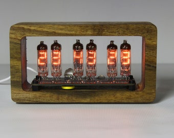 Tube clock on miniature incandescent numitrons IV-9