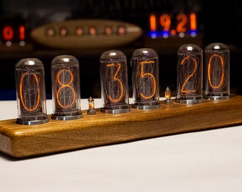 Nixie clocks with gas-discharge indicators in-18