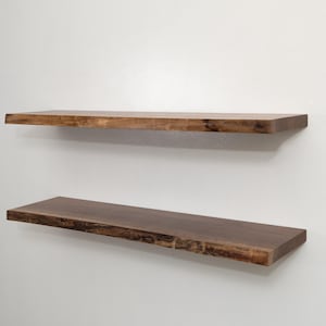 Walnut Live Edge Floating Shelves with on a Gray Wall