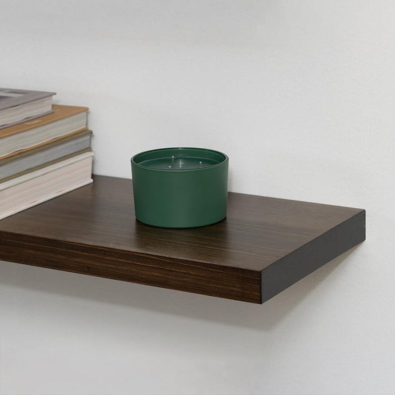 Wooden Jacobean Floating Shelf on a Wall with Books and Decorations. Heavy duty shelf with floating bracket included.