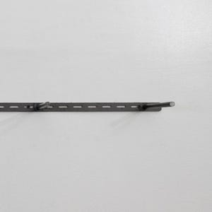 Metal Floating Bracket on a wall secured with screws