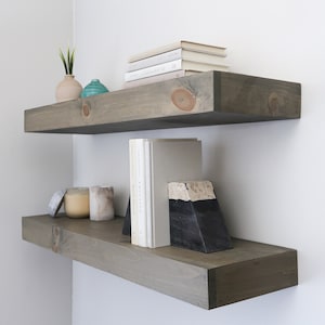 Modern floating shelves in aged barrel color