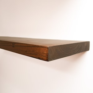 Wooden Provincial Floating Shelves on a Wall. Heavy duty shelf with floating bracket included.