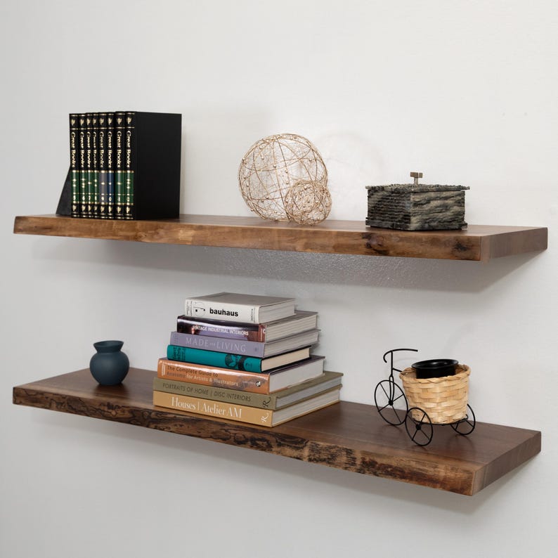 Walnut Live Edge Floating Shelves with Decorations on a Gray Wall