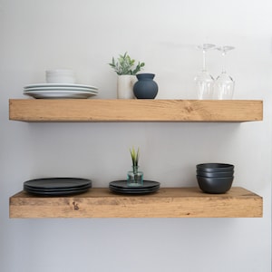 Modern floating shelves in aged oak color