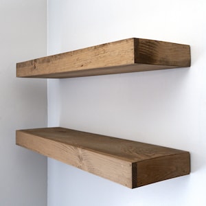 Modern floating shelves in aged oak color