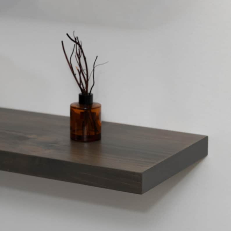 Aged Barrel Rustic Floating Shelves on a White Wall