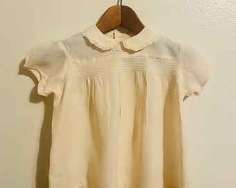 Vestido vintage de niña rosa pálido