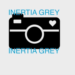 May include: Black and white camera icon with a heart in the top right corner. The text "Inertia Grey" appears above and below the icon.