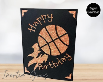May include: A black card with a glittery orange basketball and the words "Happy Birthday" on it.