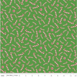 Christmas Joys Candy Canes on Green Fabric from Riley Blake