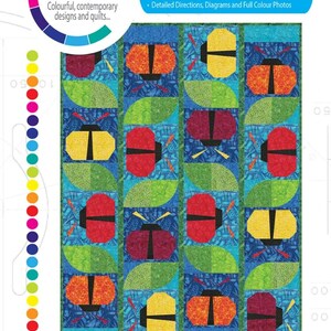 May include: A colorful quilt pattern featuring stylized ladybugs in red, yellow, orange, and burgundy, with green leaf accents on a blue background. The design includes the text "ColourBug" and "colourwerx".