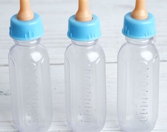 empty baby bottles for favors