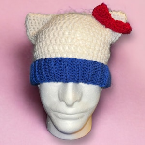 white with blue and red bow cat beanie