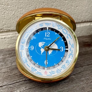 Vintage 50s Rhythm Round World Time Travel Alarm Clock Mid Century Folding Leather Travel Case Wind Up Mechanism