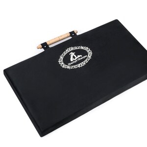 May include: Black rectangular storage case with a wooden handle and a white embroidered logo that says "Hunky Dory Crafts".