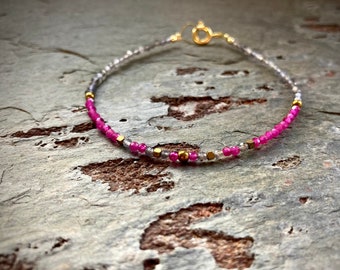 Gemstone stacking bracelet made of ruby & lolite