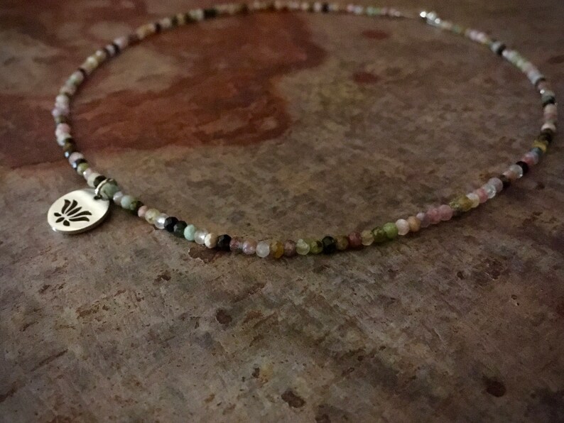Colorful natural healing stone necklace made of shiny tourmaline rondell beads and lotus blossom plate pendant made of stainless steel