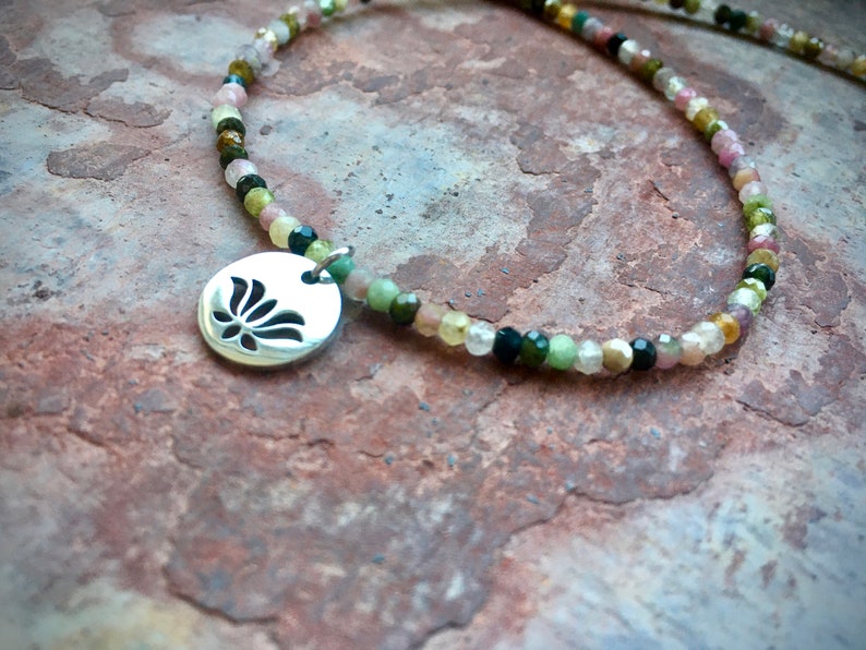 Colorful natural healing stone necklace made of shiny tourmaline rondell beads and lotus blossom plate pendant made of stainless steel