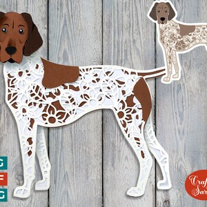 May include: A brown and white German Shorthaired Pointer dog with a white lace pattern overlay. The dog is standing on a woodgrain background. The image includes the text "Craft with Sarah".