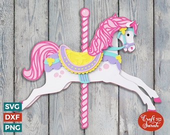 May include: A white carousel horse with a pink mane and tail, a yellow and purple saddle, and a pink and white pole. The horse is in a running pose with its legs raised. The background is a wood grain pattern.