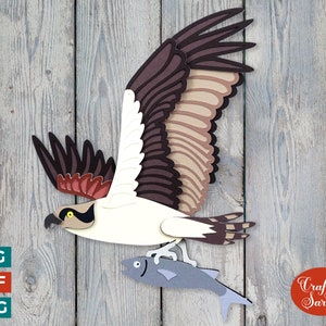 Águila pescadora con pez SVG / Archivo de corte de pájaro águila pescadora voladora en capas