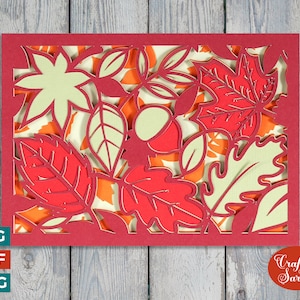 Tas de feuilles d'automne carte de voeux fichier coupé