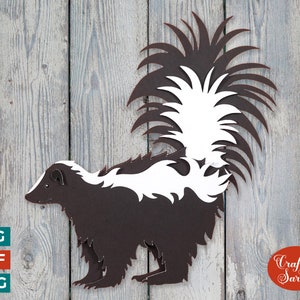 May include: A black and white silhouette of a skunk with a bushy tail. The skunk is standing on a woodgrain background. The image is labeled "Craft with Sarah".