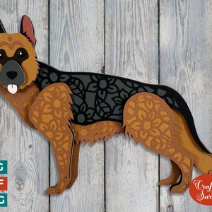 May include: A brown and black German Shepherd dog with intricate mandala patterns cut out of the paper. The dog is standing on a woodgrain background. The image includes the text "Craft with Sarah".