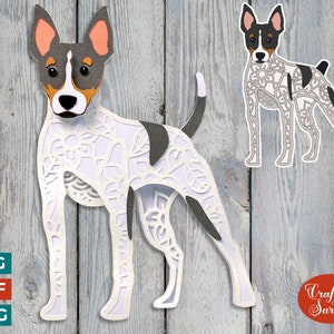 May include: White and black Rat Terrier dog with intricate floral patterns cut out of the design. The dog is standing on a wood background. The image is for a digital download of a cut file.