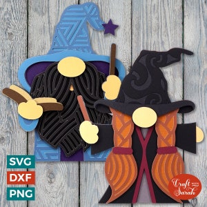 May include: Two papercraft gnomes dressed as wizards. The gnome on the left is wearing a blue hat with a star and holding a book and a wand. The gnome on the right is wearing a black hat with a swirl pattern and holding a wand. Both gnomes have orange hair and beards.