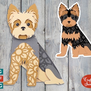 May include: A layered papercraft design of a Yorkshire Terrier dog with intricate mandala patterns. The dog is sitting with its legs crossed and has a brown and black coat. The design is perfect for paper crafting and scrapbooking.