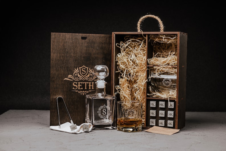 Elevate his drinking experience with our exquisite engraved decanter set, complete with whiskey stones. Crafted to perfection, this personalized gift adds a touch of sophistication to any occasion.