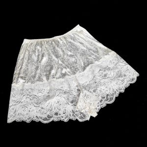 Ingen tullbeställning från USA igen!! Glansigt mönster franska trosor med spetsben storlek 7