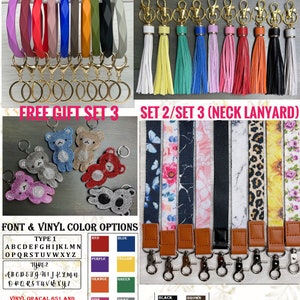 May include: Assortment of colorful silicone bracelets, keychains with tassels, and rhinestone bear keychains.  Also included are black, brown, and white lanyards with various patterns.  The image includes the text "FREE GIFT SET 1/SET 2/SET 3" and "SET 2/SET 3 (NECK LANYARD)".  The image also includes a color chart with the text "FONT & VINYL COLOR OPTIONS" and lists the colors red, blue, purple, yellow, orange, green, pink, and gray.