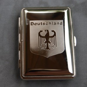 Custodia German Eagle per sigarette/carte king size, documenti d'identità, denaro, chiavette USB in modo sicuro in tasca o in borsa. Prodotto in Germania. Assemblato a mano.