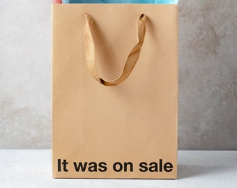 "Lustige ""It Was On Sale"" Geschenktüte, Knebel-Geschenk-Verpackung."