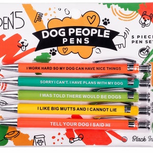 A pack of 5 funny and snarky pens packaged as "Dog People Pens", each with their own unique phrases. This set specifically contains dog puns and is catered towards dog owners.