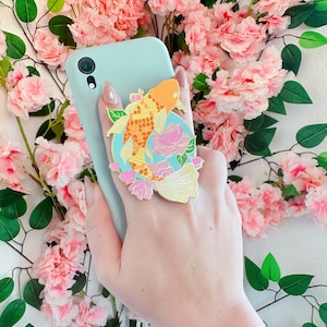 Koi fish with water lotus (comes as phone holder, pin or magnet)